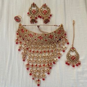 Indian party wear jewelry in gold /red
